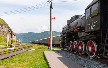 Baikal Lake. Restored historical steam locomotive L-4657 at Port Baikal station - famous tourist landmark of Circum-Baikal Railway