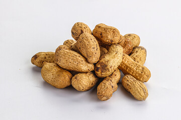 Raw ripe unpeeled peanut heap