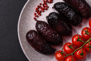 Delicious black blood sausage or black pudding with spices and herbs