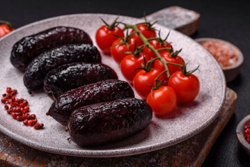 Delicious black blood sausage or black pudding with spices and herbs