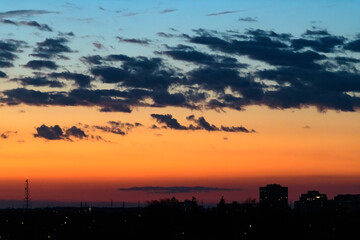 Back lit cityscape and dramatic sky, Toronto, Canada