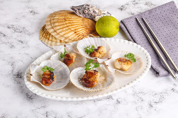 Grilled scallops shell with butter