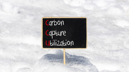 CCU Carbon capture utilization symbol. Concept words CCU Carbon capture utilization on beautiful blackboard Beautiful snow background Business ecological Carbon capture utilization concept Copy space