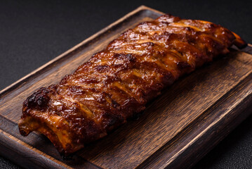 Delicious juicy grilled ribs with honey and mustard sauce