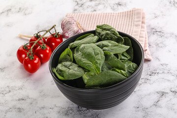 Green spinach leaves in the bowl