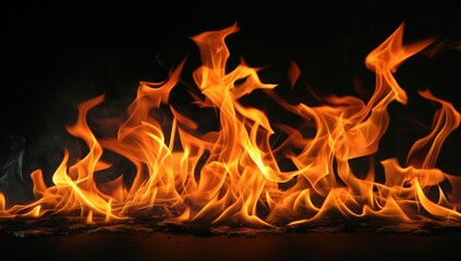 Fototapeta premium Fire embers particles over black background. Fire sparks background. Abstract dark glitter fire particles lights. bonfire in motion blur