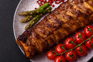Delicious juicy grilled ribs with honey and mustard sauce