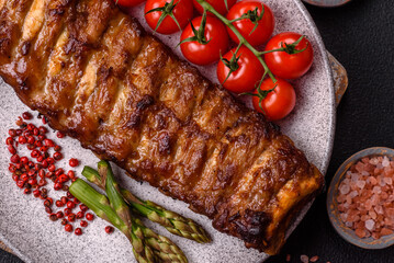 Delicious juicy grilled ribs with honey and mustard sauce