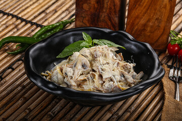 Italian pasta with chicken and mushrooms