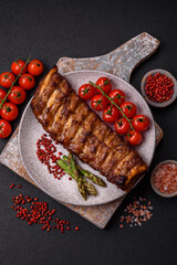 Delicious juicy grilled ribs with honey and mustard sauce