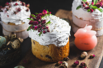 Easter cake with Swiss meringue and  flowers. Easter eggs