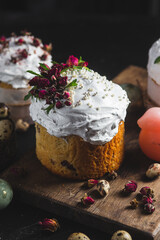 Easter cake with Swiss meringue and  flowers. Easter eggs