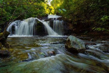 Woodland waterfall on the Ilabekken river by the city of Trondheim, Norway