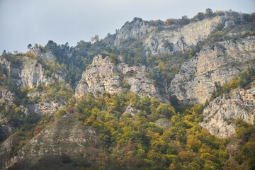 Naklejka premium Beautiful natural landscape. The autumn season. Mountains covered with forest.