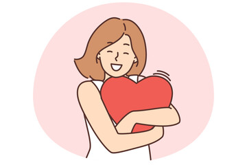 Happy woman hold heart in hands