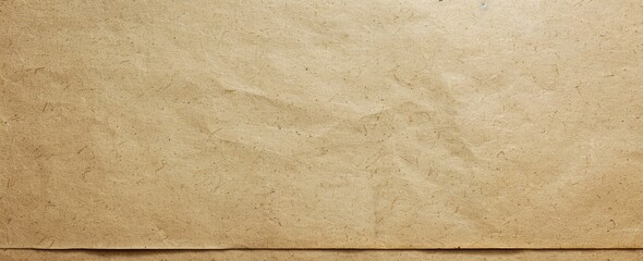 A close up image showing a piece of weathered brown paper on a surface