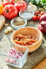 Step-by-step cooking process. Sliced sausage and onion