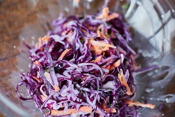 Purple cabbage salad with carrots.
