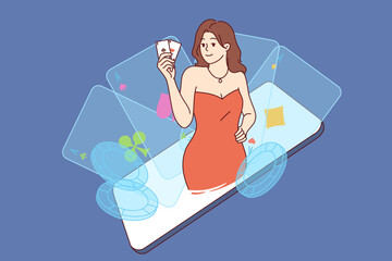 Woman winner of poker tournament in mobile casino looks out of phone and holds playing cards in hand. Girl urges to download casino or gambling app for smartphone to have good time