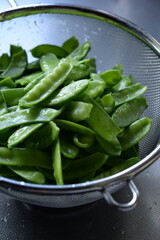 Green peas with flat edible pods.