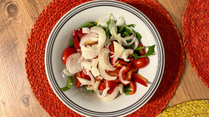 Fried fish and salad ready to be served on a plate
