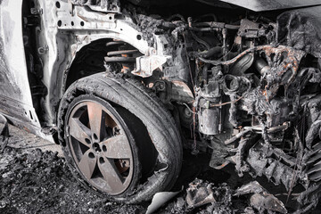 close-up of a burned-out car
