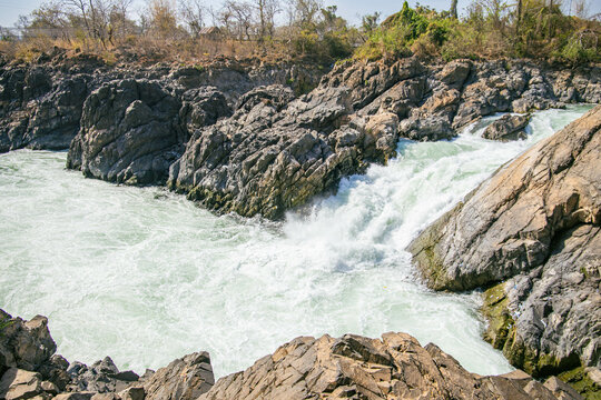 the thunderous waters of at Somphamit Waterfalls in Don Det, Laos