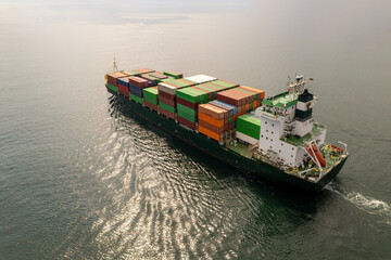 Large container ship at sea. Aerial top view of cargo container ship vessel import export container...