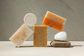 Handmade soap from natural ingredients, various herbs. Concept of sustainable use, bath products. Front view