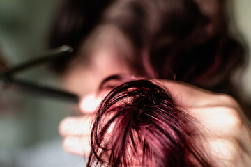 Woman with scissor to cut hair