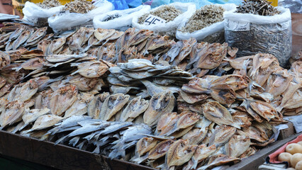 A stack file  of dried fish on display in the Philippine Sari sari store.