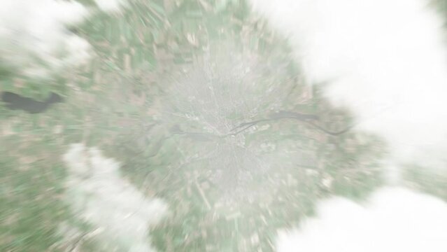 Earth zoom in from space to Randers, Denmark. Followed by zoom out through clouds and atmosphere into space. Satellite view. Travel intro. Images from NASA