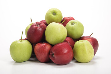 Assorted Fresh Red and Green Apples on a White Background During Daylight