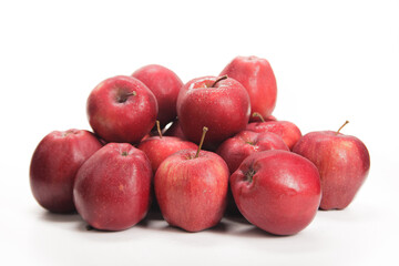 Assorted Fresh Red and Green Apples on a White Background During Daylight