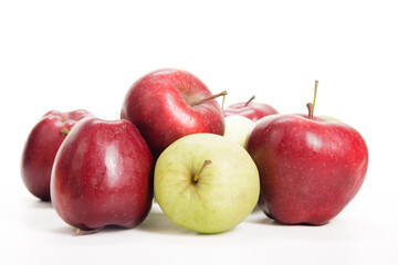 Assorted Fresh Red and Green Apples on a White Background During Daylight