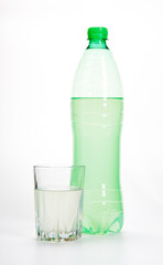 Clear Plastic Water Bottle With Green Cap on White Background, Daytime