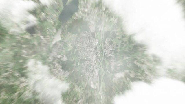 Earth zoom in from space to Kerava, Finland. Followed by zoom out through clouds and atmosphere into space. Satellite view. Travel intro. Images from NASA