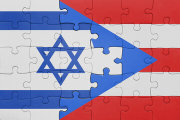 puzzle with the colourful national flag of puerto rico and flag of israel.