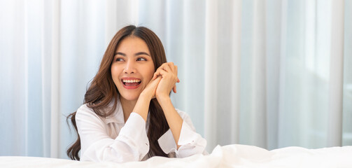 Portrait of smiling cheerful beautiful pretty asian woman clean fresh healthy white skin posing...