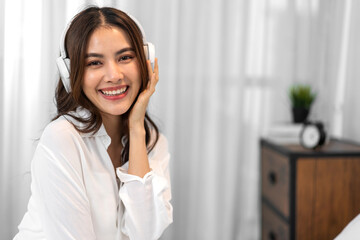 Portrait of smiling cheerful beautiful pretty asian woman clean fresh healthy white skin posing...