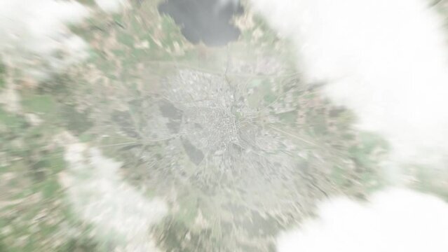 Earth zoom in from space to Linkoping, Sweden. Followed by zoom out through clouds and atmosphere into space. Satellite view. Travel intro. Images from NASA