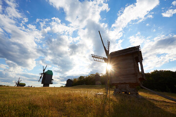 Traditional ukrainian windmill in the museum of national architecture in Pirogovo in a beautiful summer day, Kiev