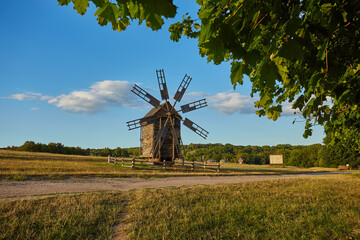 Old Ukrainian windmill under dramatic skies