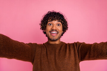 Photo of cheerful positive funky man blogger wear stylish brown clothes isolated on pink color...
