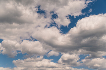 White clouds and blue sky. Beautiful heavenly background.