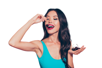 Portrait of nice cheerful cute sweet lovely winsome well-groomed wavy-haired girl opened mouth eating enjoying ripe cherries isolated over pink pastel background
