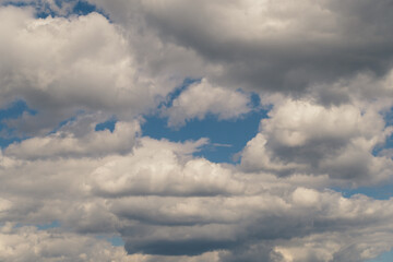 White clouds and blue sky. Beautiful heavenly background.