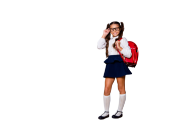 Full size body length of glad content nice smart cute small little girl with curly pigtails in white blouse shirt and blue short skirt with red bag, touching glasses. Isolated over black background