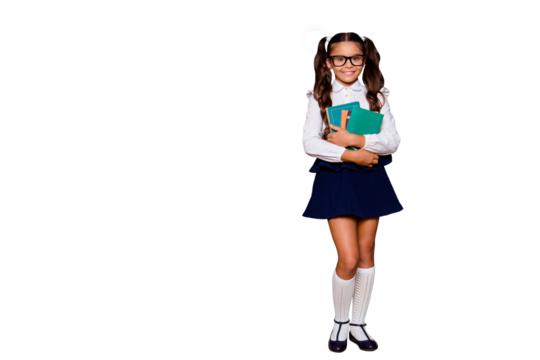 Full size body length of glad positive nice adorable cute small little girl with curly ponytails in white blouse shirt and skirt, carrying, hugging big book pile. Isolated over black background