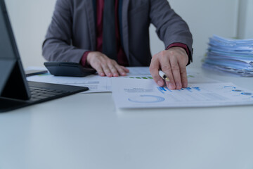 Business Documents concept : Employee woman hands working in Stacks paper files for searching and checking unfinished